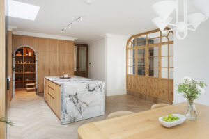 Kitchen ideas - Designer Bespoke Kitchen - black and white marble worktop with light oak cupboards, oak flooring by Papilio Kitchens